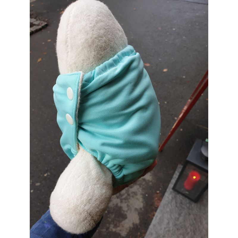 Myllymuksut alt-i-ett-bleie sideknepping